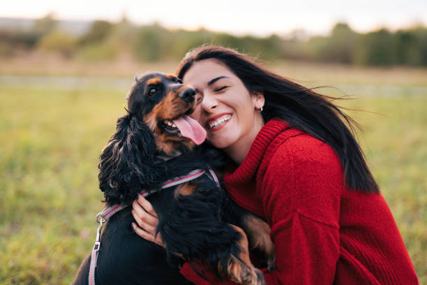 istock Young woman with a dog 1771392363