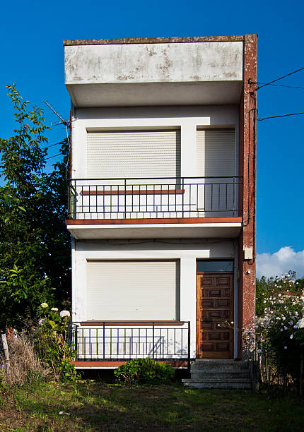 istock Vertical Two Story Narrow Brick House with Balconies 177139339