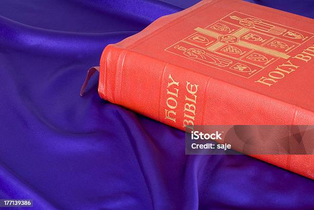 Bible On Purple Silk Stock Photo - Download Image Now - Antique, Bible, Book