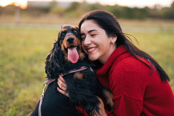 istock Young woman with a dog 1771393995