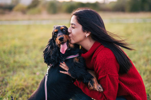istock Young woman with a dog 1771393996