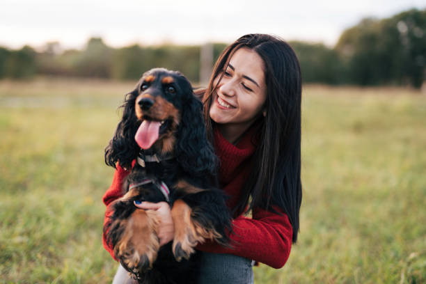 istock Young woman with a dog 1771394536