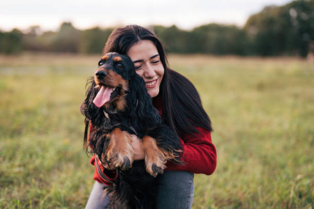 istock Young woman with a dog 1771395054