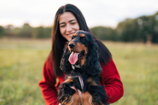 istock Young woman with a dog 1771397755