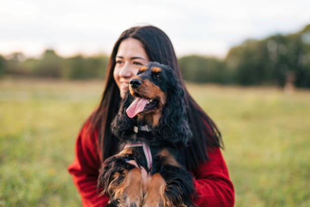 istock Young woman with a dog 1771397756