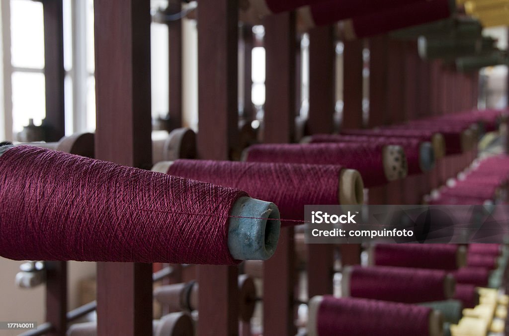 old loom with cotton old loom with pink red cotton Accuracy Stock Photo