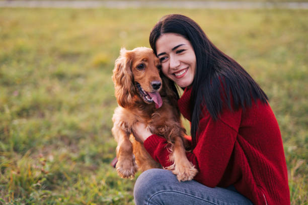 istock Young woman with a dog 1771401612