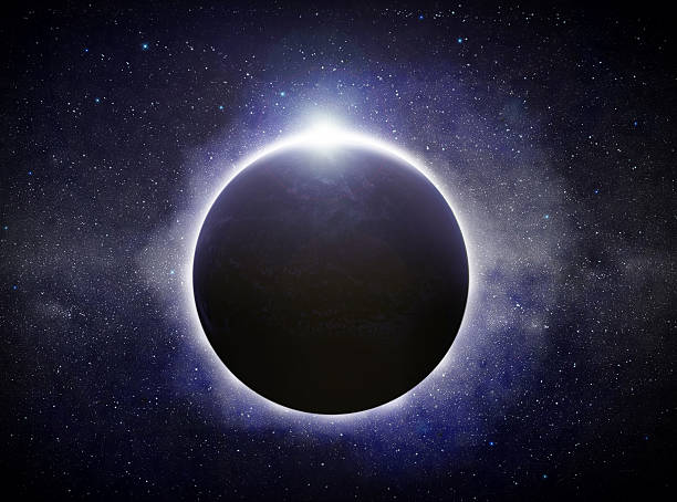 A solar eclipse on planet earth stock photo