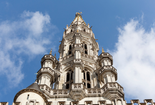 Ornate Brussels Town Hall in Grand Place with detail of tower