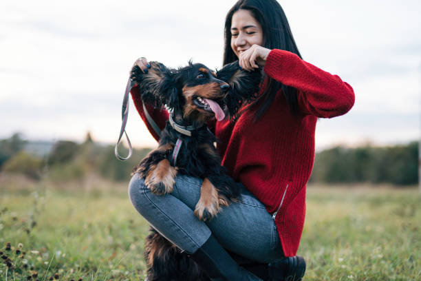 istock Young woman with a dog 1771409712
