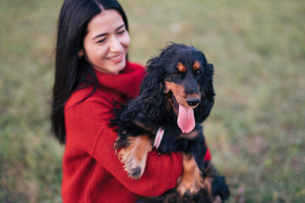 istock Young woman with a dog 1771412358