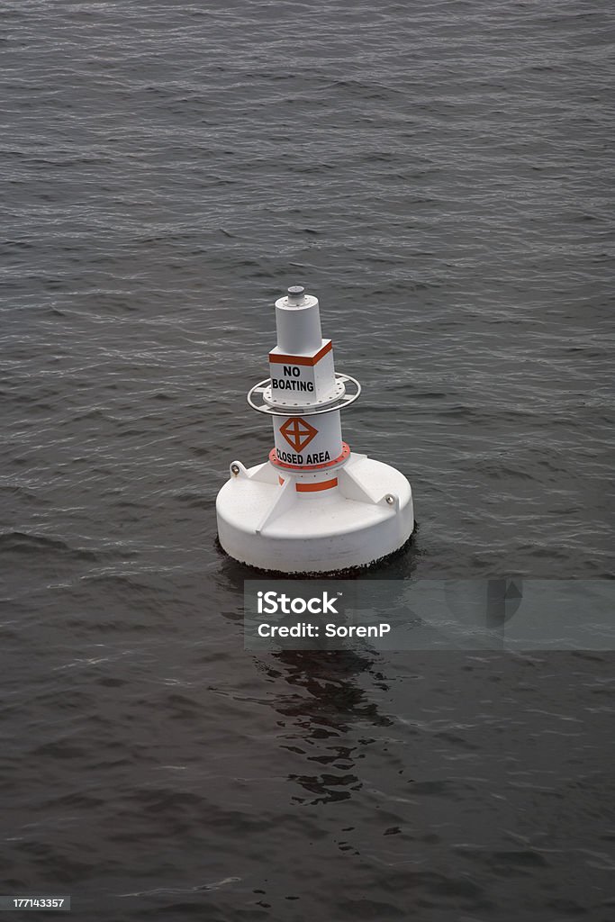 No Boating A marker in the water displaying NO Boating area Buoy Stock Photo