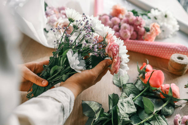 istock Florist at work. Woman making autumn floral decorations 1771437769