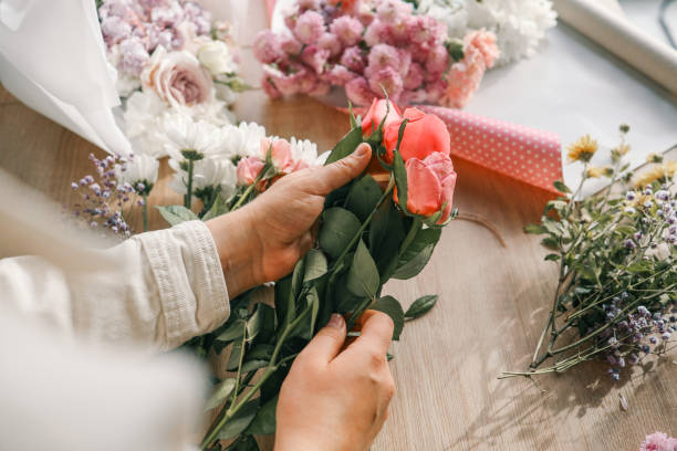 istock Florist at work. Woman making autumn floral decorations 1771437772