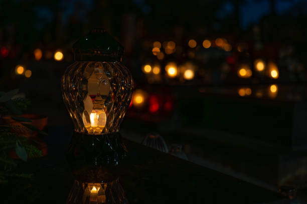 istock Candles in the cemetery at night 1771442717