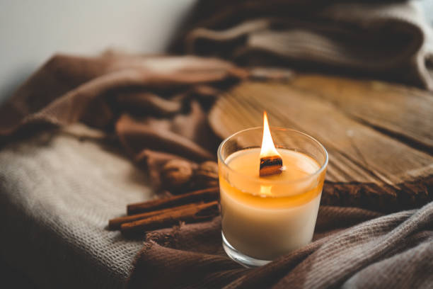 istock Burning candle in home interior, autumn aesthetics 1771452627