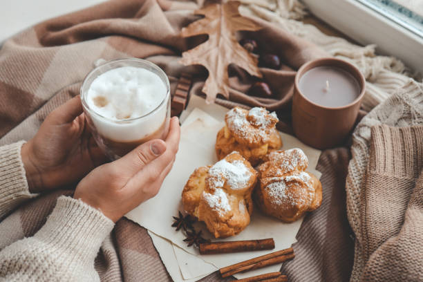 istock Cup of coffee in hands, cozy autumn 1771457071