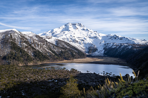 Lake on the feet of a volcano at dawn in La Araucania region, chilean Patagonia