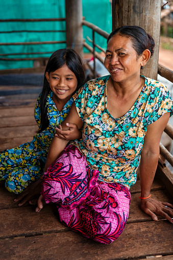 Portrait of mother and daughter near Tonle Sap, Cambodia
