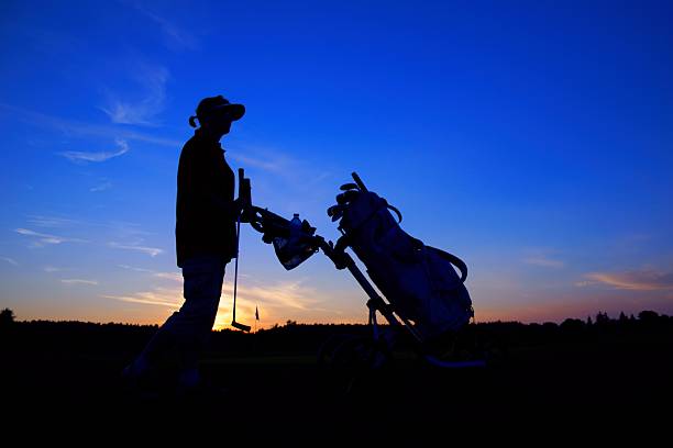istock Golf, woman golfer at sunset, as backgrounds 177148113
