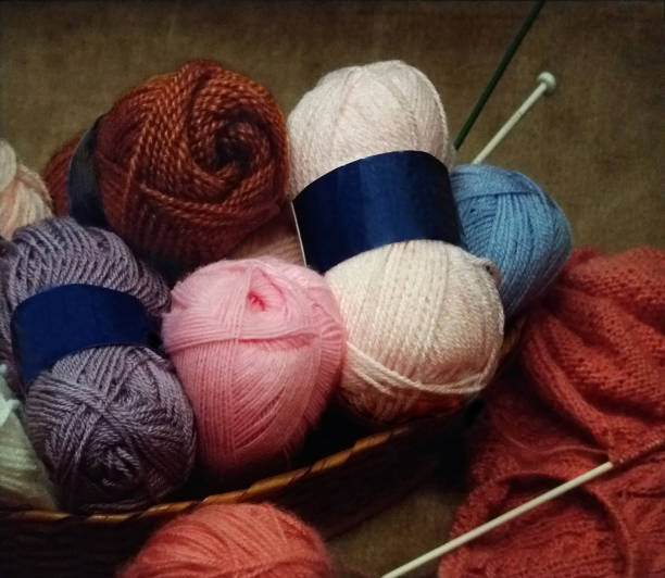 Ball of wool and knitting needles