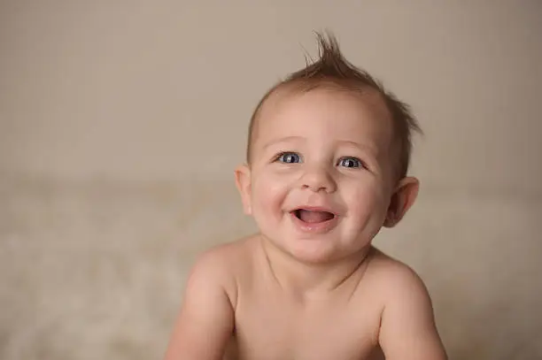 Photo of Closeup of Smiling Baby With Dimples