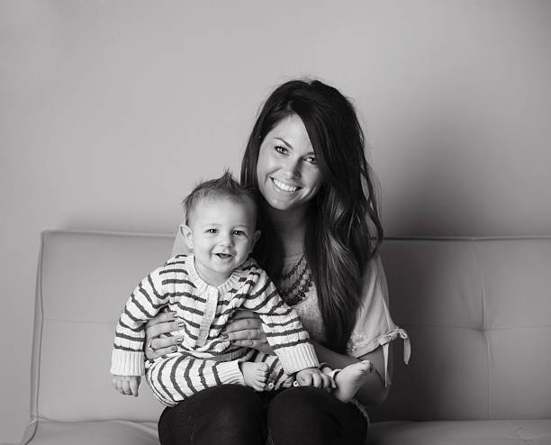 istock Mother and Son Sitting on Couch 177148756
