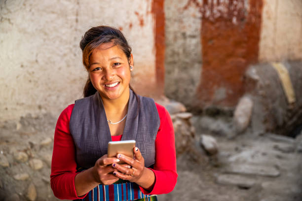 istock Tibetan young woman using mobile phone, Upper Mustang, Nepal 1771490387
