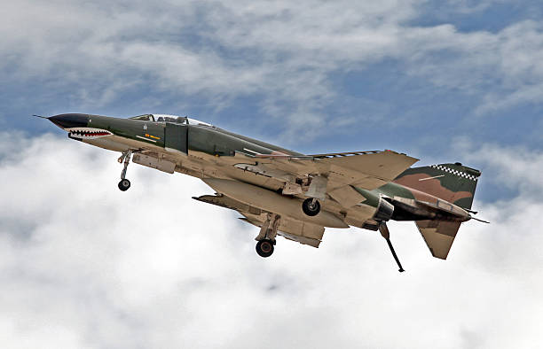 Camouflaged Fighter Jet on Take Off with Clipping Path