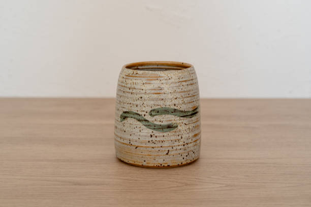 istock Handcrafted tumbler on a wooden table 1771540512