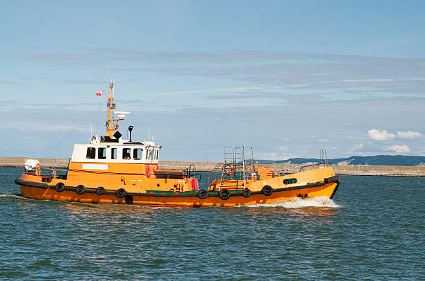 istock harbor tug on the sea 177155265