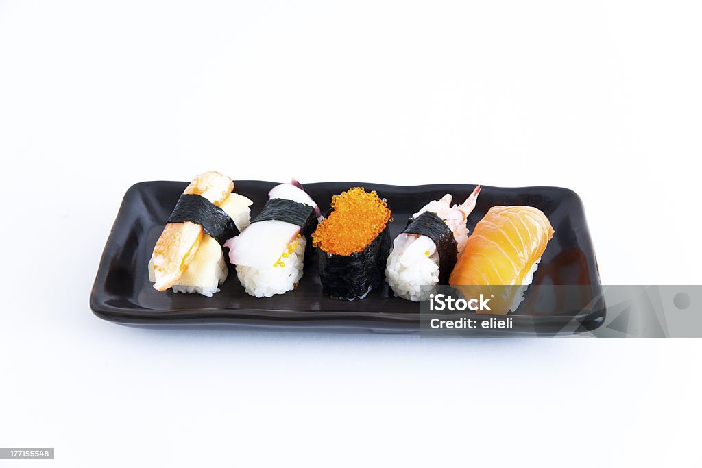 sushi con sfondo bianco - Foto stock royalty-free di Caviale