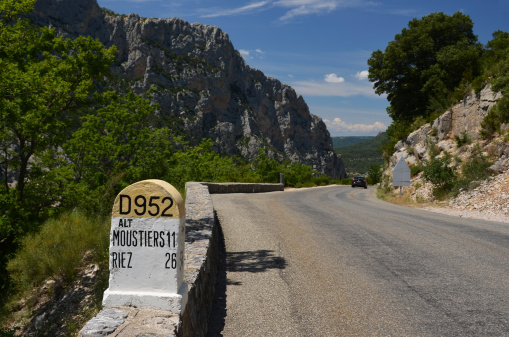 Milestone on narrow road D952 above canyon Verdon, Provence, France