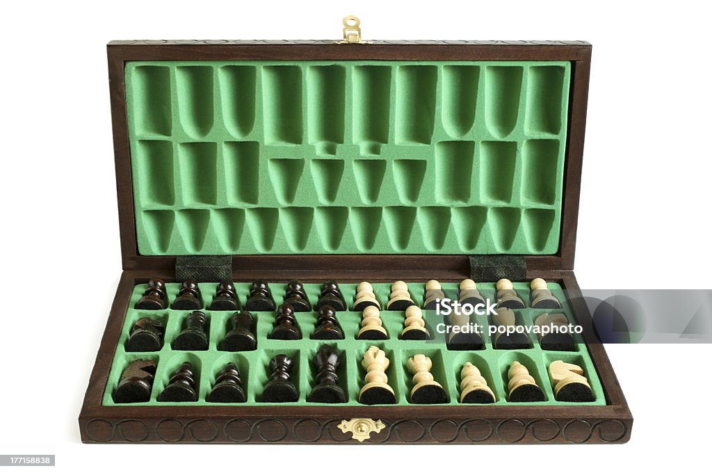 Wooden chessboard with chessmen Wooden chessboard with chessmen on a white background Army Stock Photo