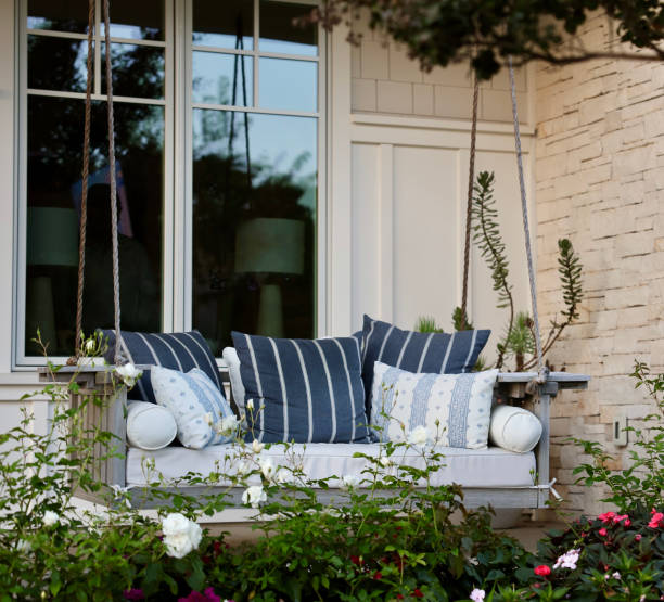istock Charming cottage with an old fashioned porch swing 1771590244