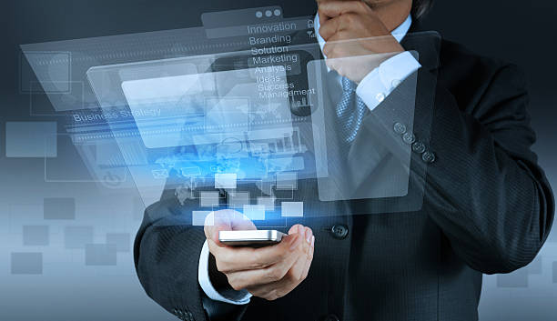 istock A businessman using a smart phone to display a slideshow 177162100