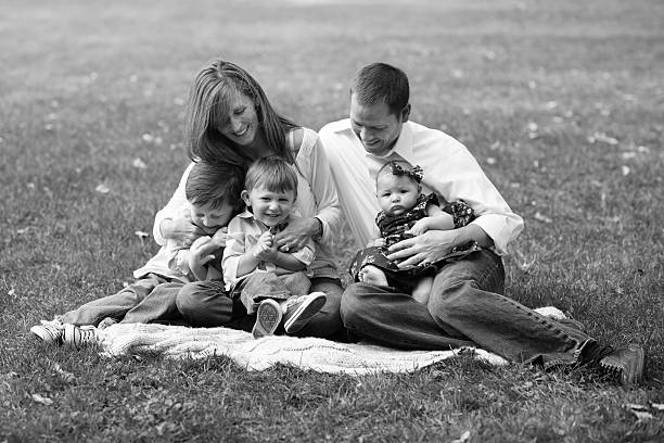 istock Laughing Family Sitting Outside 177164971