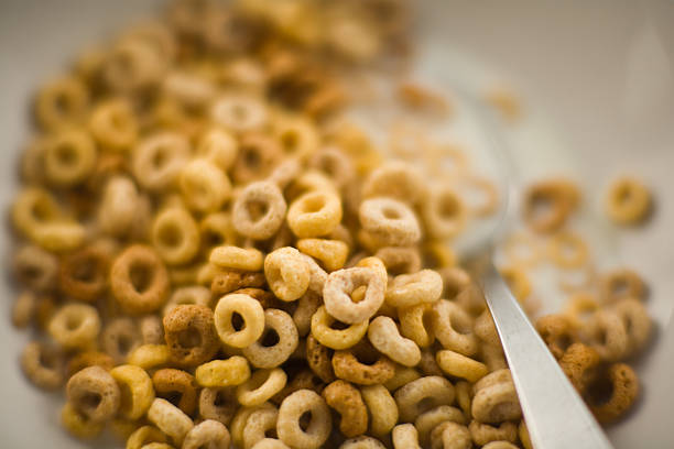 Bowl of ring shaped breakfast cereal stock photo