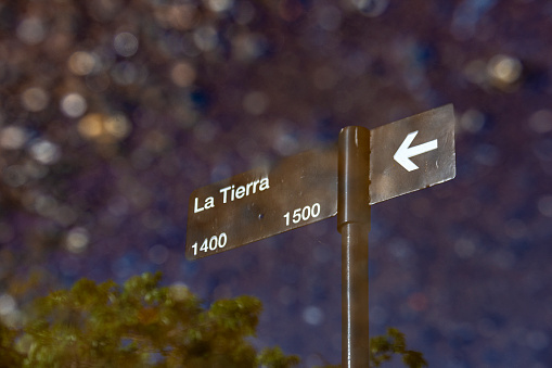 A reflection of a educative traffic signboard, on a water puddle, on the Urquiza park, in Rosario city, Santa Fe province, Argentina. On october 19, 2023.