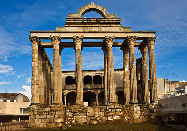 It is one of the many buildings at the Roman Emerita-Augusta; today, Merida. .This is the only religious building remaining on its original place at Merida. It was built at the end of the 1st century b.C. and is a great construction on the Municipal Comitium. Therefore it should have been a model of luxury and decoration. This temple was probably devoted to Augustus Emperor worship, not to Diana, as can be understood from the many sculptorical elements found. They represent persons from the Imperial family