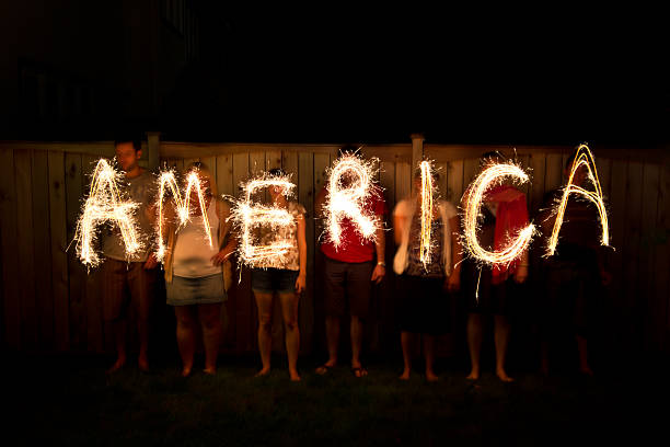 The word America in sparklers as part of Independence Day (July 4th) celebration
