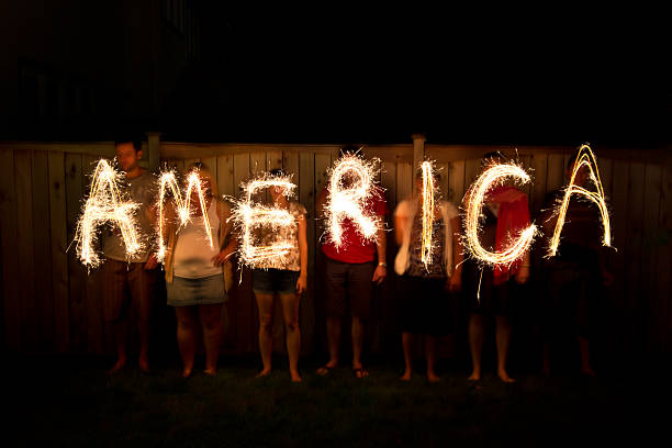 America in sparklers - Independence Day celebration, July 4th stock photo