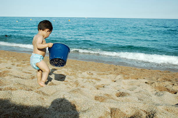 Beach and baby ! stock photo