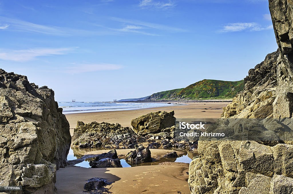 Pedras de afirmar uma vista da Baía Killantringan - Royalty-free Dumfries e Galloway Foto de stock