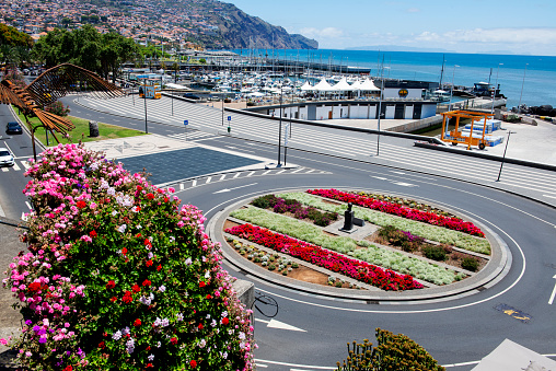 Decorating a  bouquet of flowers   on the  street during flower festival in Madeira