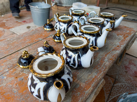 The Uzbek porcelain teapots.