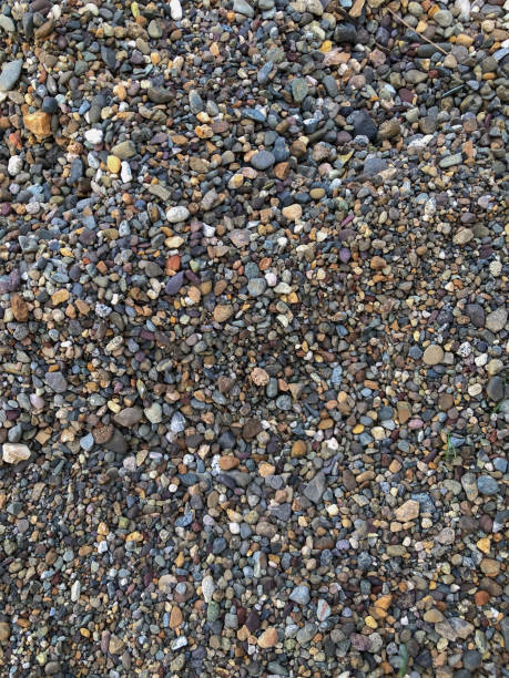 istock Closeup photo of pebbles and sand 1772002202