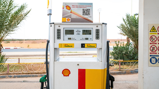 Fes, Morocco - 13 September 2022: Shell gas station pump with oil price on the digital panel. Concept of oil prices increasing.