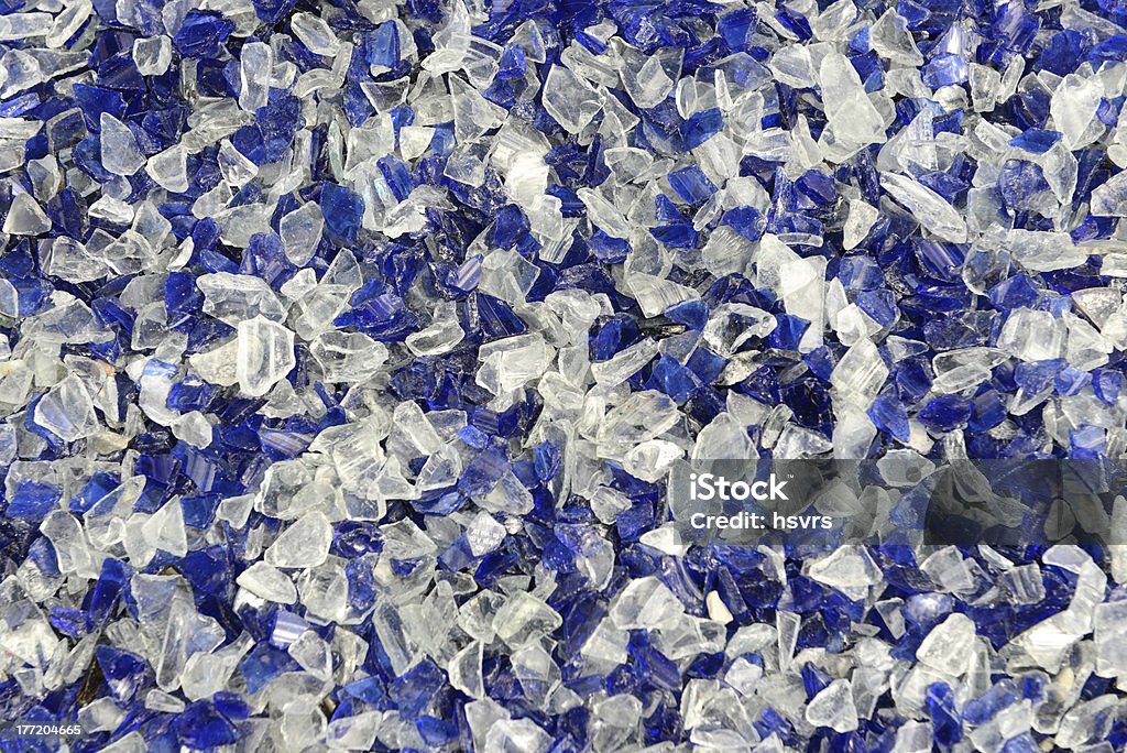 broken glass blue shards ready for recycling Destruction Stock Photo