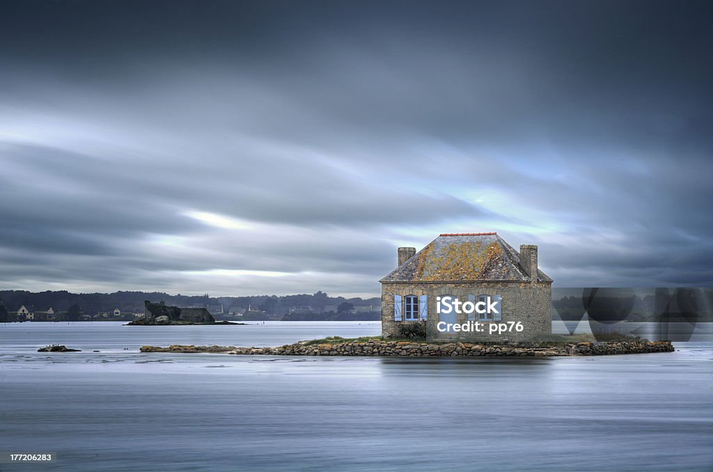 Beautifull house isolated on small island in Britanny, France Cliff Stock Photo